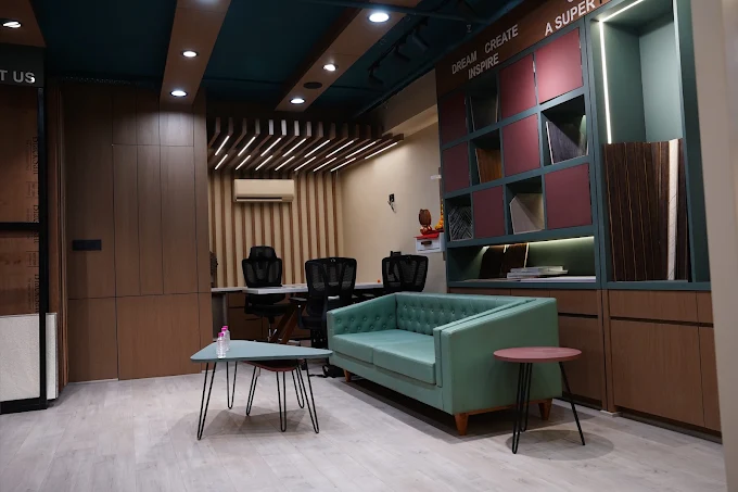 Lounge area inside ELM Wood Studio with a sample display wall